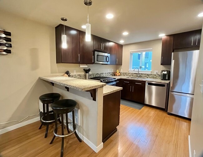 Photo - Stylish Greenwood Townhome with Private Patio & Modern Finishes