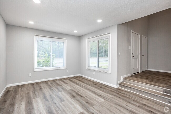 3BR, 1.5BA - 1,142SF - Living Room