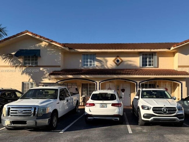 Building Photo - 10017 W Okeechobee Rd Unit 201