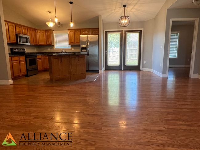 Building Photo - NEWLY PAINTED! Walk Out Basement & Much, Much More!