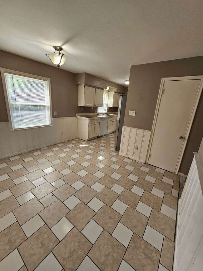 Photo - 3-Bedroom, 2-Bathroom Ranch with Hardwood Flooring, Tiled Kitchen and Finished Basement with a 2 ...