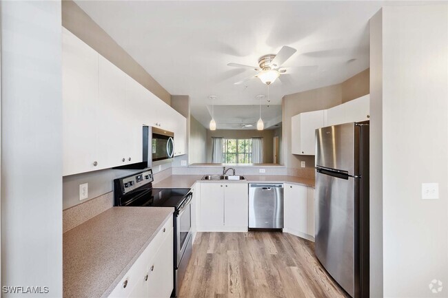 Building Photo - 7823 Regal Heron Cir Unit 9-302 Rental