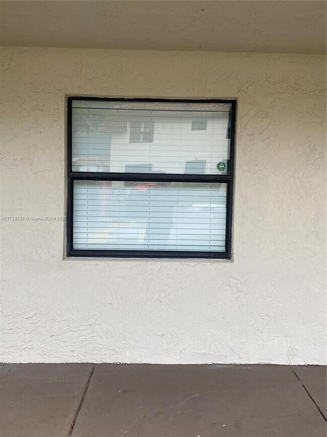 Photo - 911 NE 209th Terrace Unit 105