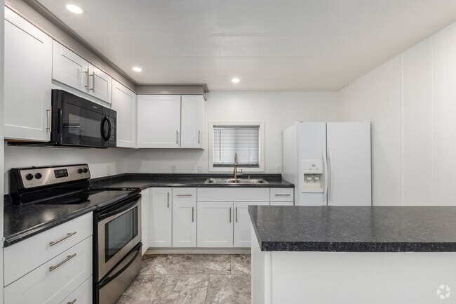 Building Photo - Remodeled 2-Bedroom, 2-Bath Home in Gated ...