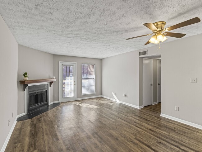 Our Montgomery apartments at Stratford Village offer inviting living areas with fireplaces and year-round ceiling fan comfort, professionally operated by Highlands Vista Group.