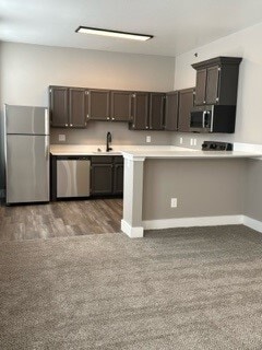 Countertop Bar & Kitchen Area One Bedroom Floorplan "F"