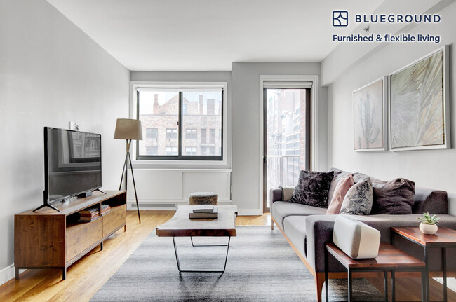 Building Photo - 101 W 15th St Rental