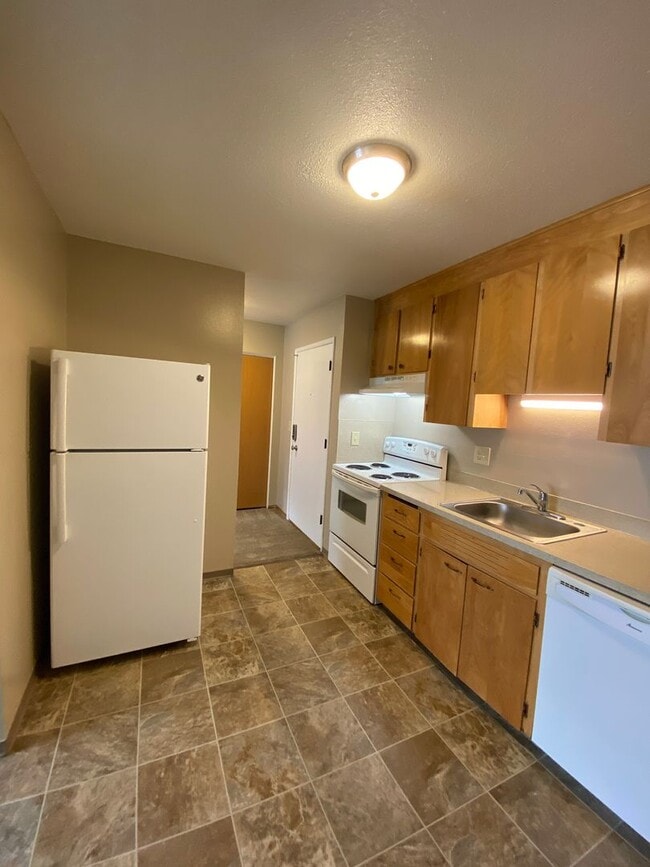 Photo - Keyless Entry • On-Site Laundry • Free WiFi Unit 22