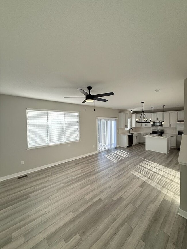 Photo - Spacious 4-Bedroom Home with 2-Car Garage & Yard