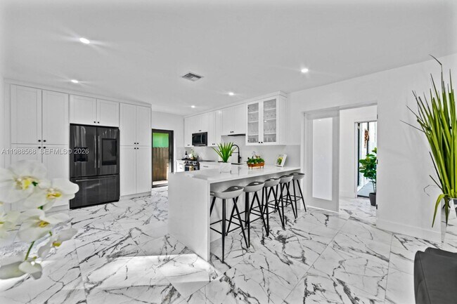 Photo - Northeast 137th Terrace, North Miami, FL 33181 - 4 BR 2 BA single-family home