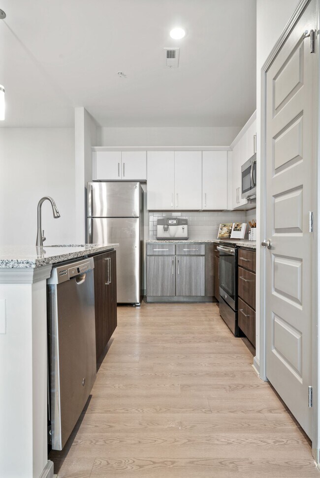 Two color custom cabinetry in your kitchen at Hawthorne at the Glen in Concord, NC - Hawthorne at the Glen