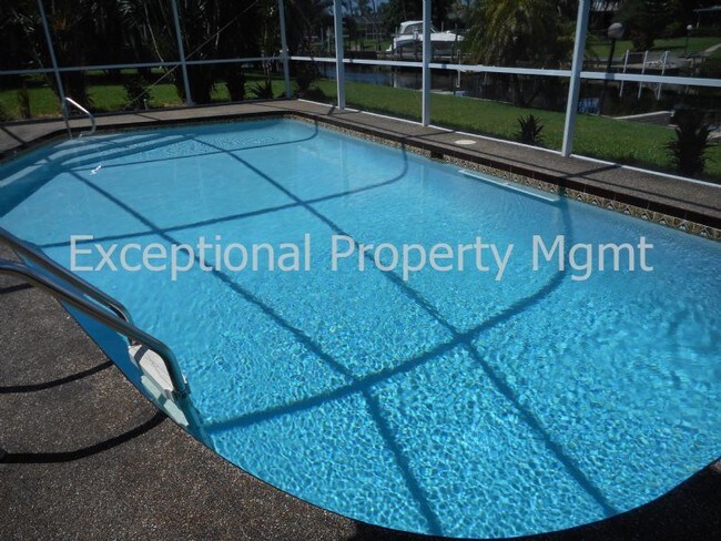 Building Photo - Spacious Home with Luxurious Primary Suite + Den on Oversized Gulf Access Lot!