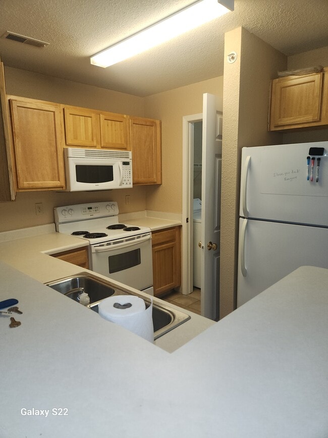 Kitchen - Saddleback Ranch Apartments Unit 730-103