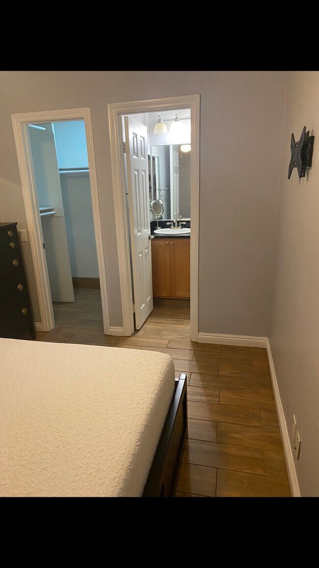 In Suite Bedroom #2 with Queen storage bed
