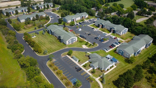 Discover our well-maintained community featuring ample parking and beautifully landscaped green spaces, professionally operated by Highlands Vista Group.