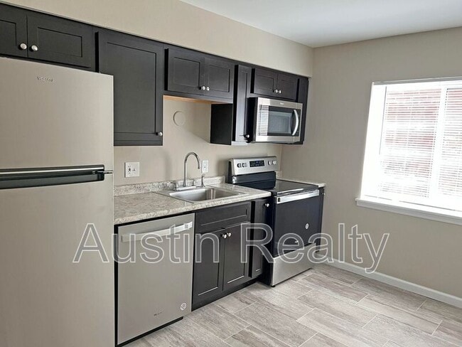 Building Photo - 5468 Cologne Ave Unit Apt E