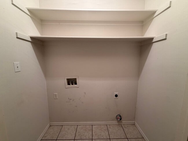 Photo - This 3-bedroom, 2-bathroom house in Russellville, AR offers a practical layout and convenient loc...
