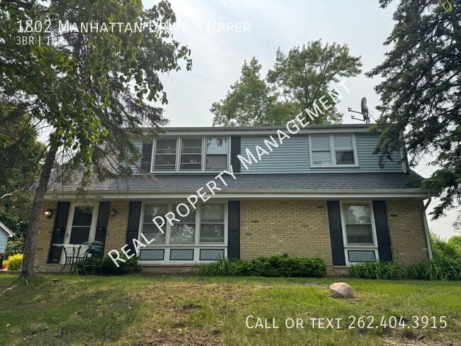 Building Photo - 1802 Manhattan Dr Unit Upper Rental