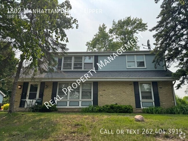 Building Photo - 1802 Manhattan Dr Unit Upper Rental