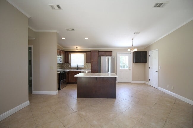 Photo - 4BR/2BA Central Pensacola Cottage with Open Living, Vaulted Ceilings, Stainless Appliances & Larg...