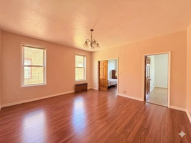 Building Photo - 8666 24th Ave Unit 2nd Floor