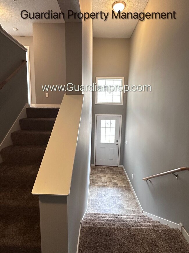 Photo - Champlin Town Home, 2 Car Garage, Dishwasher, Washer/Dryer, Balcony, May/June Move in Dates