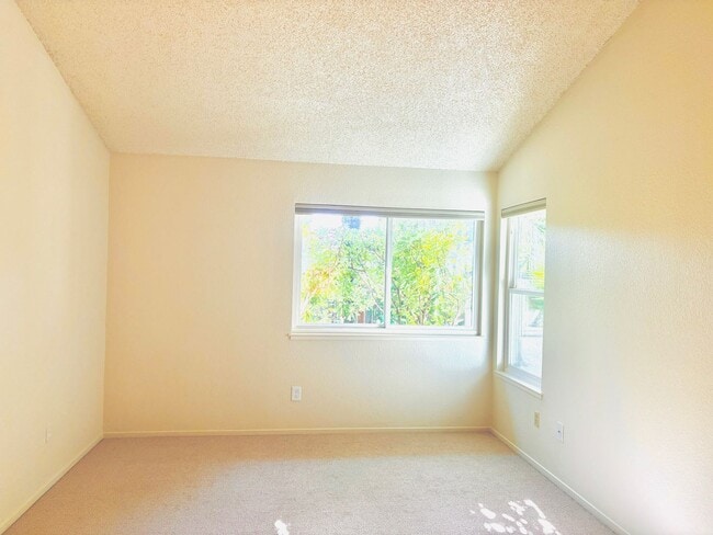 Photo - House like 2bed/1.5 Bath Condo with Spacious Corner Yard and 2 Car Garage