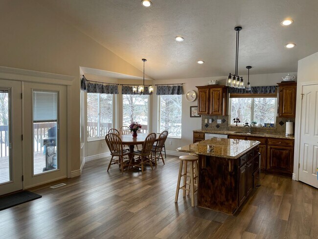 Photo - Beautiful home with 3 car garage and oversized covered deck.
