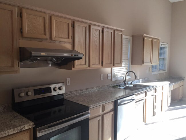 Photo - Elegant 4 Bedroom 2.5 Bath House w/ Primary Suite on 1st Floor + a Fenced-in Backyard @ Park Vill...