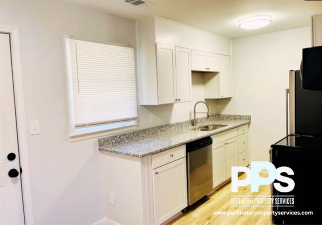 Photo - 6127-6129 E Fayetteville Dr