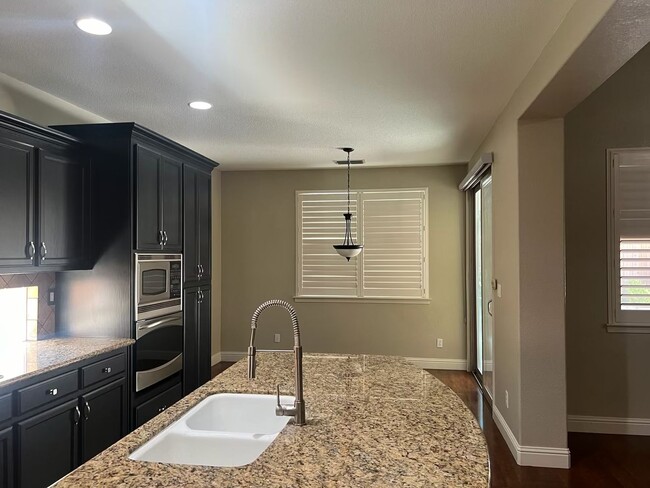 Photo - Charming 4-Bed, 2-Bath Single-Story Home f...