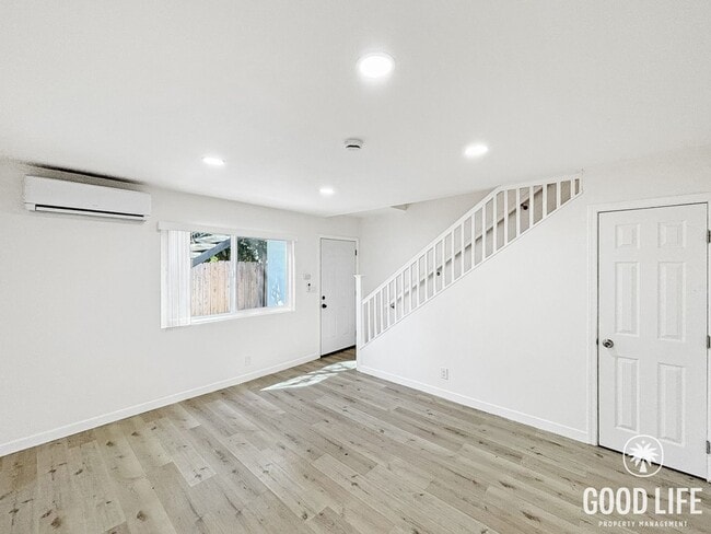 Photo - Two-Level 2-Bed/1-Bath Condo in Normal Heights | Granite Counters, Central A/C + In-Unit Laundry Unit 4370