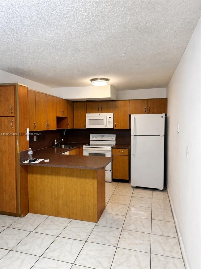 Photo - 555 NE 123rd St Unit 215-D