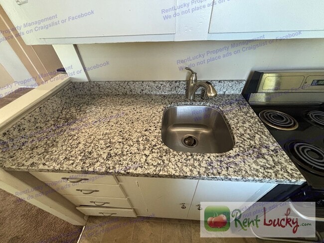 Photo - Singh Tacoma 4-Plex Unit 1