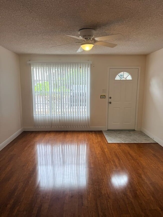 Photo - 2 BR/3BA | Newly Renovated Single Family Home | Community Pool | Private back porch!
