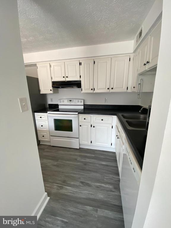 Building Photo - 3500 Lochearn Ct Unit K Rental