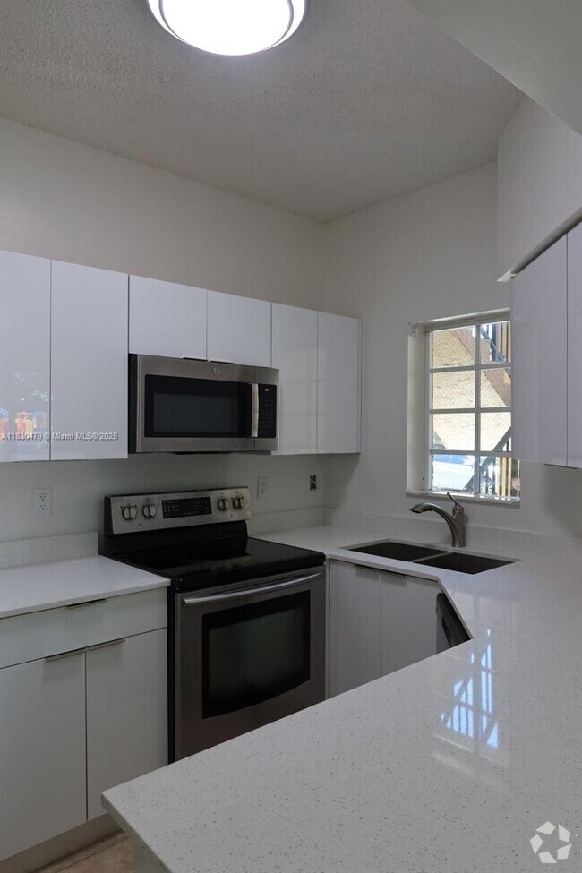Building Photo - 18340 NW 68th Ave Unit A Rental