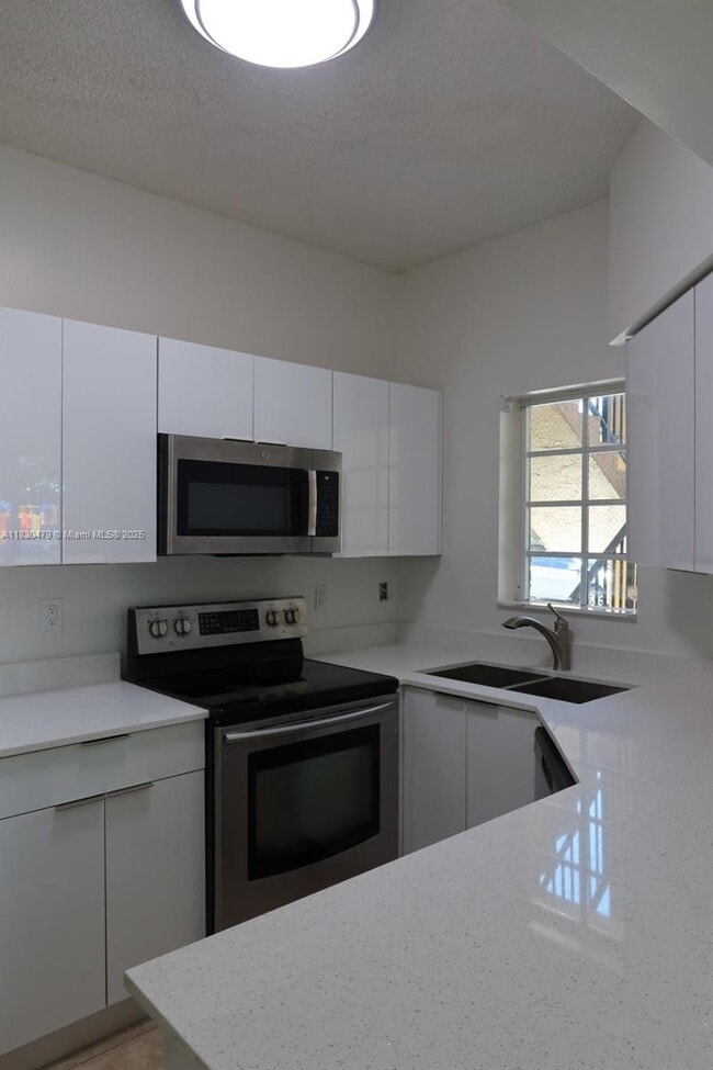 Photo - 18340 NW 68th Ave Apartment Unit A