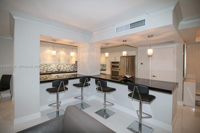 Building Photo - 9801 Collins Ave Unit 9W