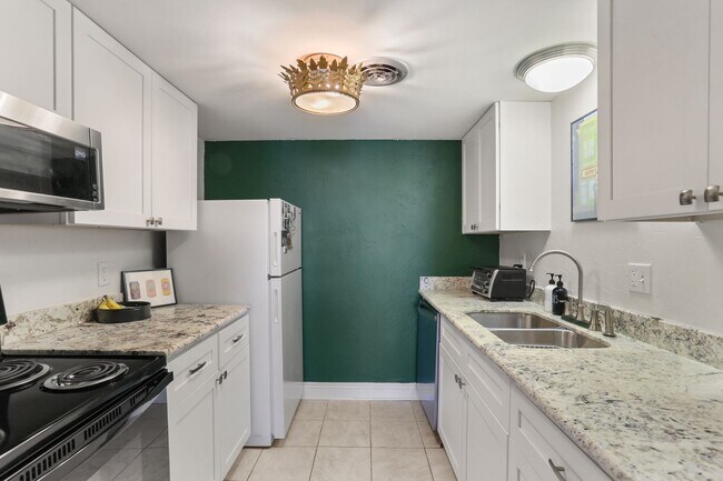 Photo - Gated Condo steps from Maple Street & St Charles!