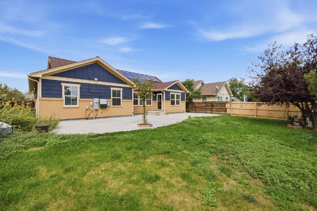 Photo - Spacious 5-Bed Retreat with Modern Updates in Aurora. Included - Greenhouse and Shed!