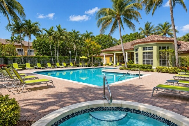 Relax in the sun-drenched pool at Delray Bay, surrounded by lush palm trees and vibrant greenery. This serene oasis invites you to unwind and soak in the tranquility. Join us today and elevate your living experience!