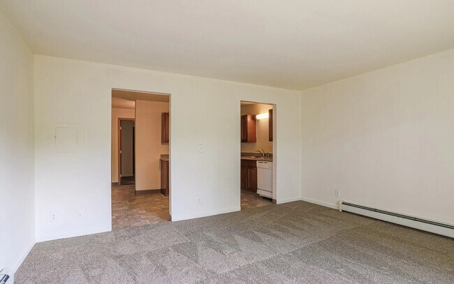 Living area looking into kitchen.