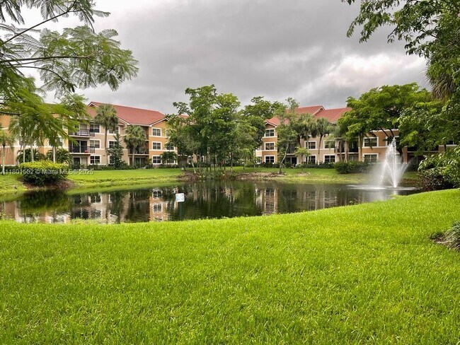 Photo - 8781 Wiles Rd Condo Unit 101