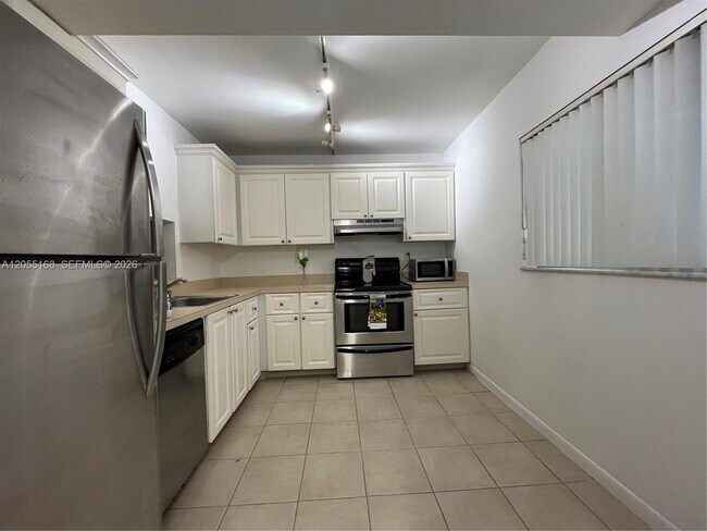 Photo - 701 N Pine Island Rd Unit 202