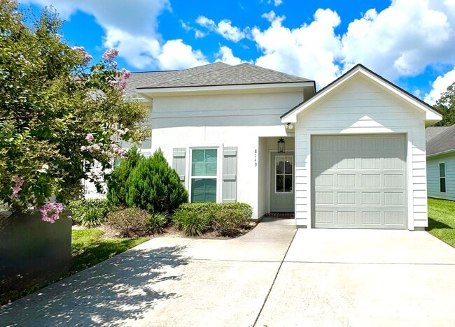 Photo - Elegant Townhouse in StoneLake Village – Stylish 3BR/2BA with Garage & Patio