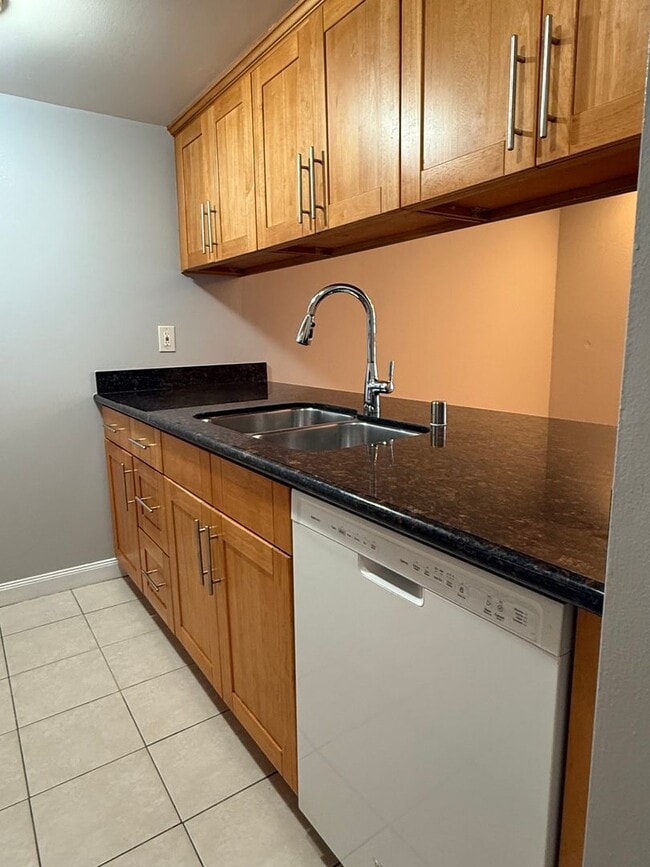Photo - Spacious 2 Bedroom 1 Bath Condo with private patio and storage Unidad M