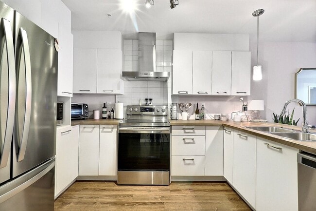 Photo - 3171 Bd de la Gare Unité 105