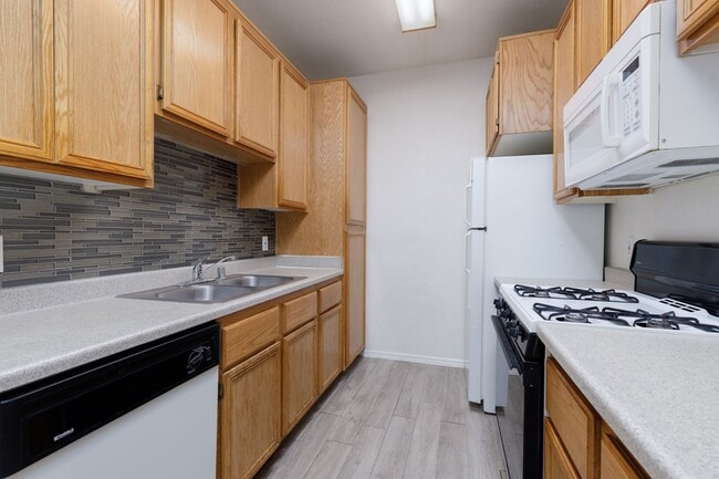 Photo - Two bedroom unit in gated NE community with pool