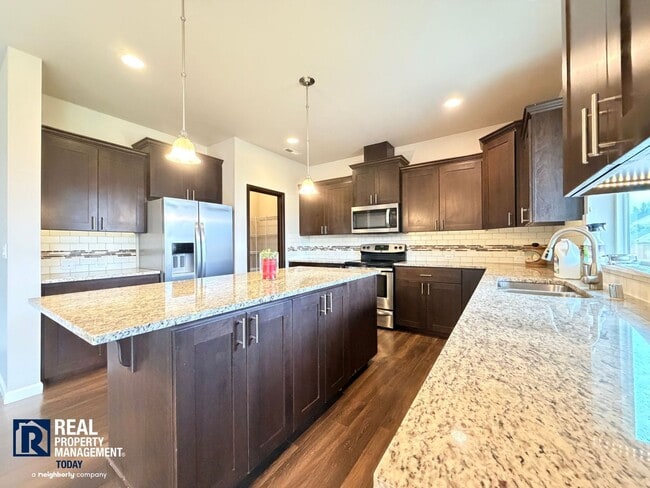 Photo - Spacious 5BR Home | Fenced Yard | Garage | Pets Negotiable